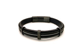 Black braided bracelet on a white background